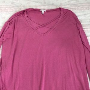 A magenta, pink long sleeve shirt